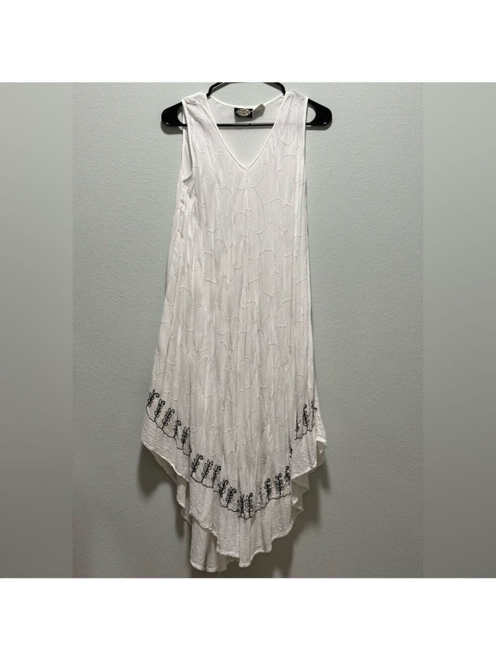 Pagoda White Dress/Coverup Black embroidered design on the bottom One size Rayon